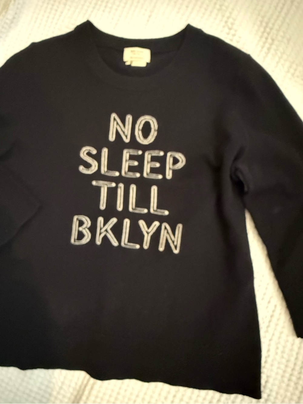 kate spade Black and Cream “no sleep till Bklyn” sweater